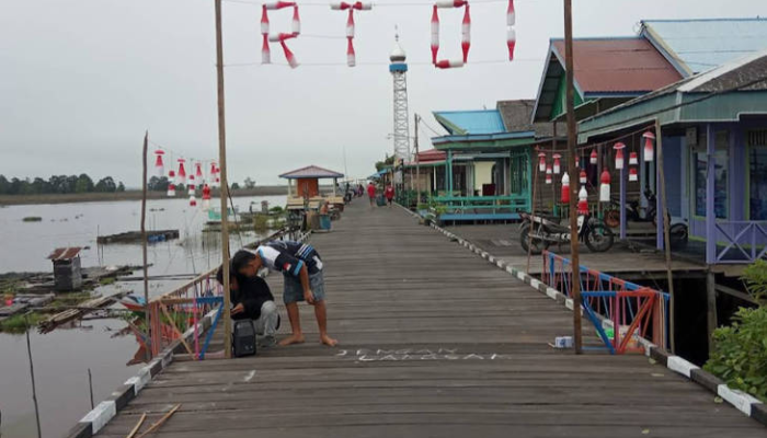 desa-wisata-pela,-menyaksikan-pesut-mahakam-hingga-menyelami-kearifan-lokal