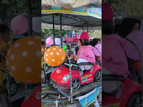 kicau mania naik odong-odong balon polkadot